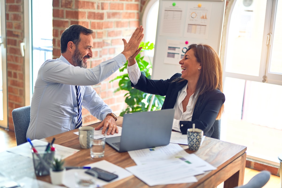 Marketing specialists reviewing a multi-channel campaign plan