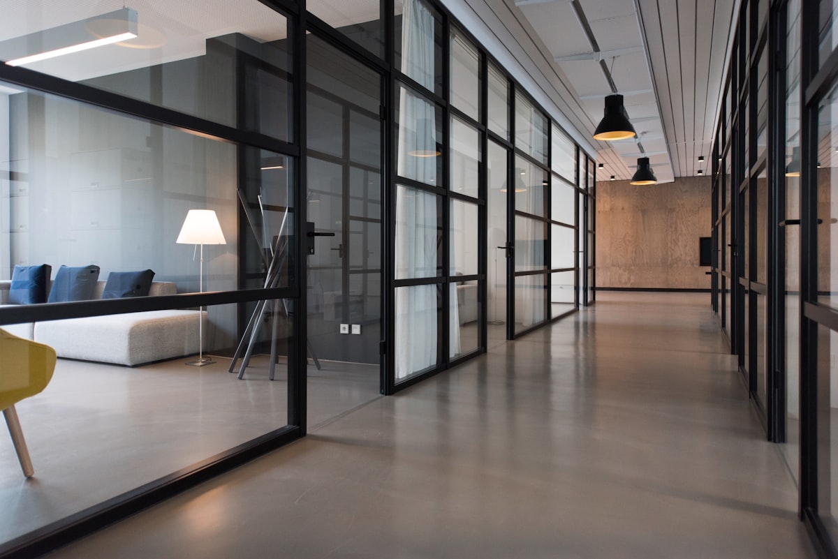 Modern agency reception area with warm lighting and seating